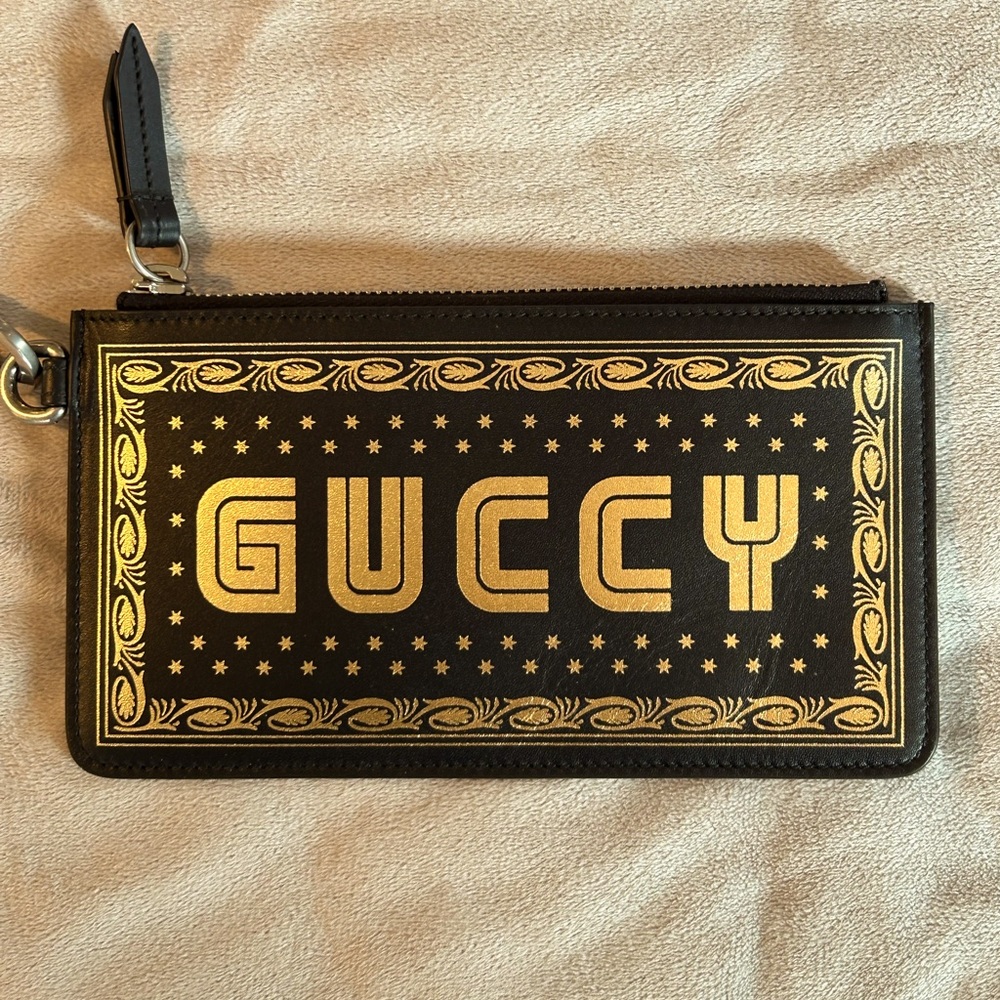 Gucci Sega wristlet clutch